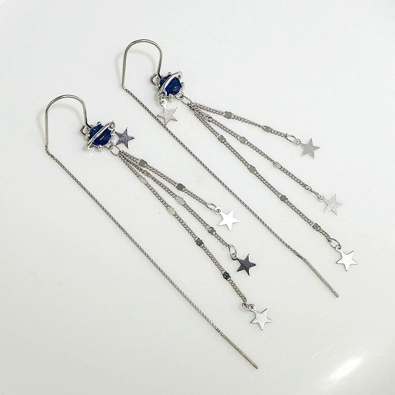 Close-up detail of the sparkling zircons and plating on the Star Threader Earrings