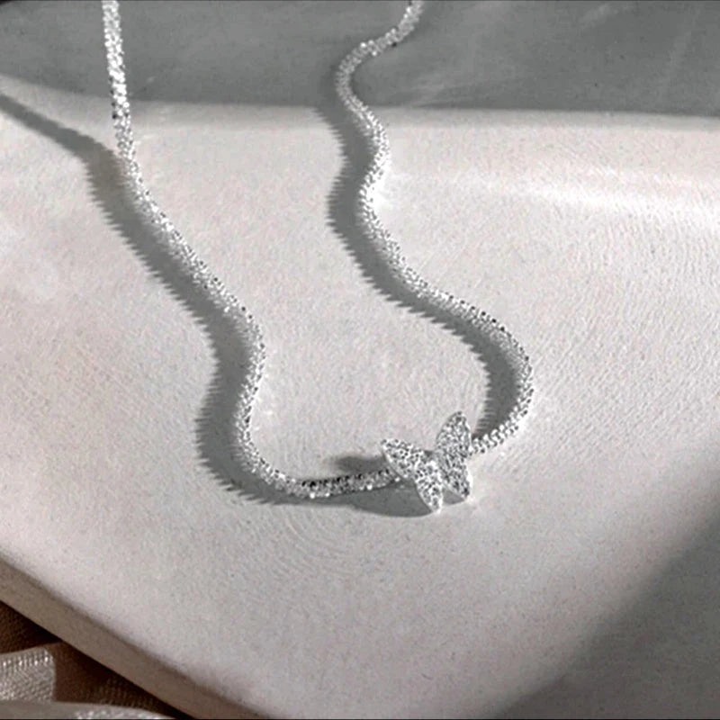 Close-up of the pendant and clasp on the Sparkling Butterfly Necklace