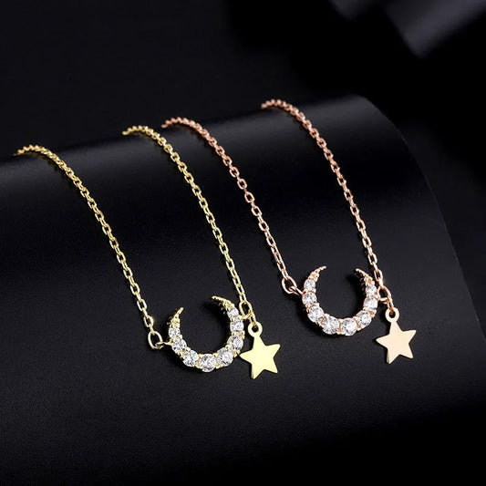 Sterling Silver Star And Moon Necklace worn to showcase its length and pendant detail