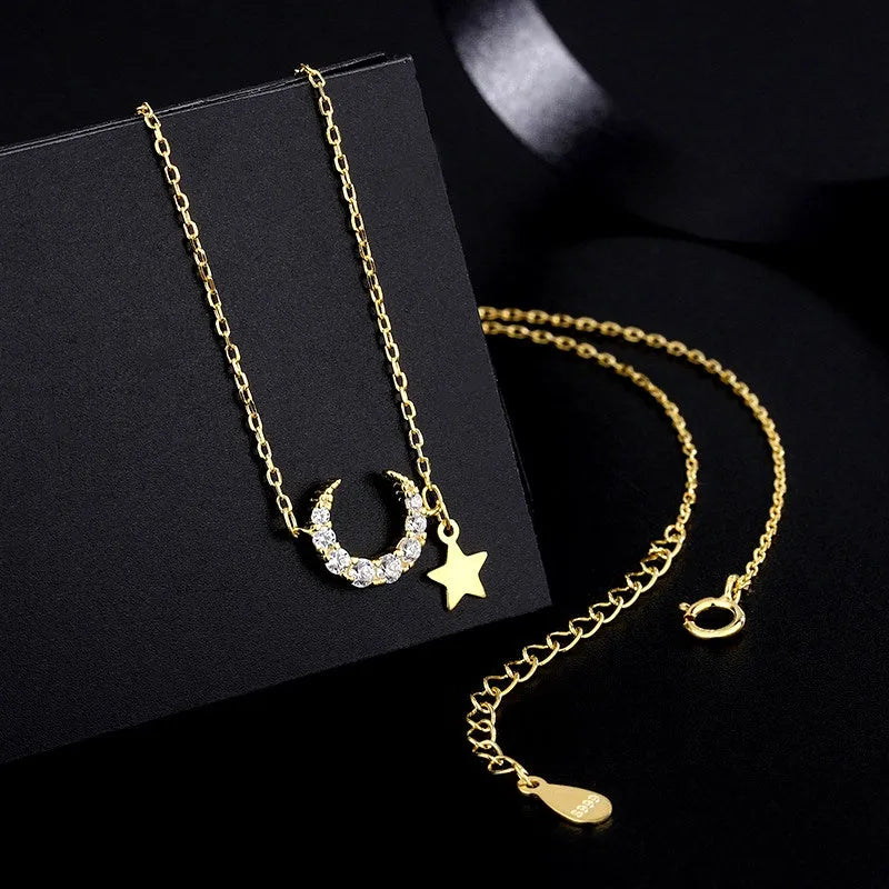 Detailed view of the Sterling Silver Star And Moon Necklace chain and pendant
