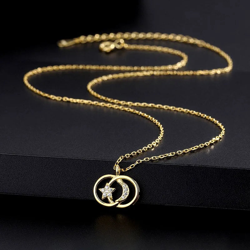 Close-up of the pendant and clasp on the Star and Moon Necklace