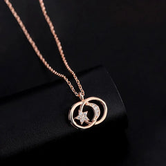 Detailed view of the Sterling Silver Star And Moon Necklaces chain and pendant