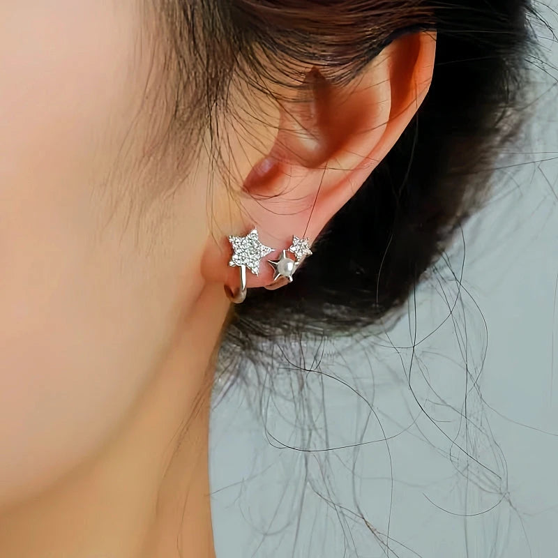 Close-up detail of the sparkling zircons and plating on the Star and Pearl Studs
