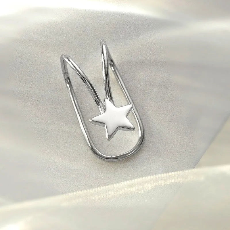 Angled view of the Sterling Silver Star Ear Clips ( 1 Pair )