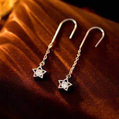 Angled view of the Sterling Silver Star Ear Hook Earrings