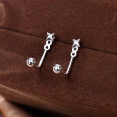 Angled view of the Sterling Silver Star Round Bead Earring