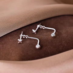 Close-up detail of the sparkling zircons and plating on the Star Ear Jackets