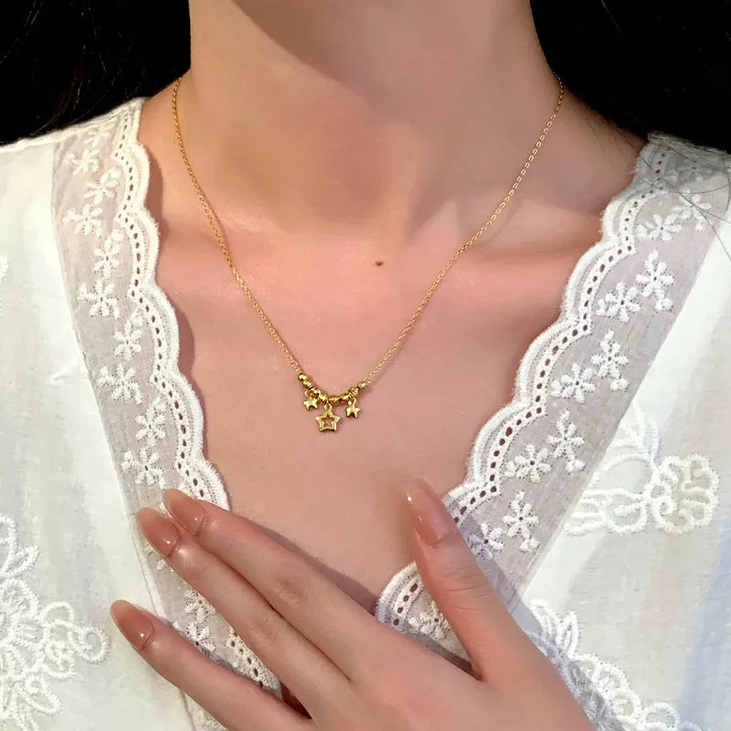 Sterling Silver Star Tassel Necklace worn to showcase its length and pendant detail