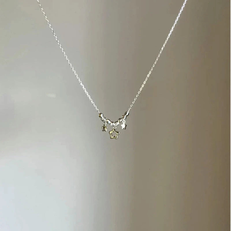 Close-up of the pendant and clasp on the Star Tassel Necklace (*Correction: Handle and original tags imply necklace*)