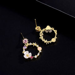 Close-up detail of the sparkling zircons and plating on the Fairy Flower Earrings