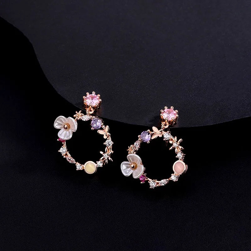 Angled view of the Sterling Silver Super Fairy Flower Earrings