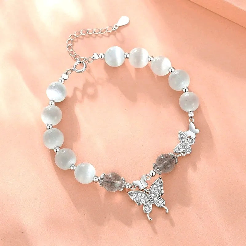 Close-up of the clasp and charm details on the Butterfly Bead Bracelet