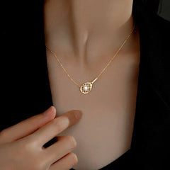 Sterling Silver Tennis Racket Pearl Necklaces worn to showcase its length and pendant detail