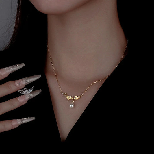 Sterling Silver Thorn Flower Branch Necklaces worn to showcase its length and pendant detail