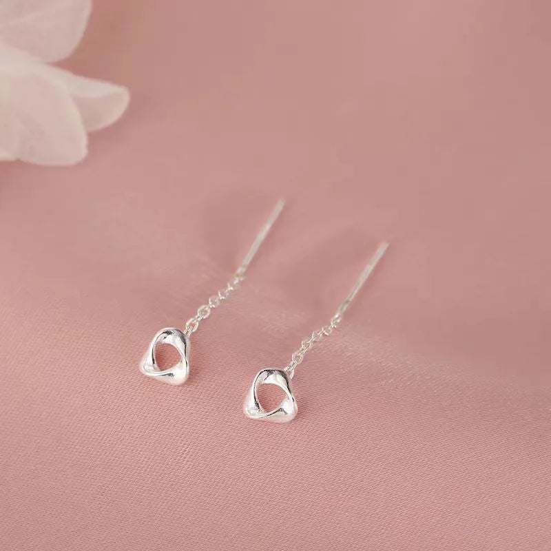 Angled view of the Sterling Silver Threader Earrings