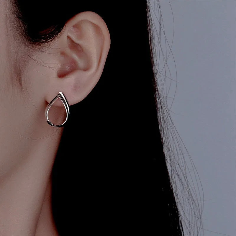 Close-up detail of the sparkling zircons and plating on the Water Drop Earrings