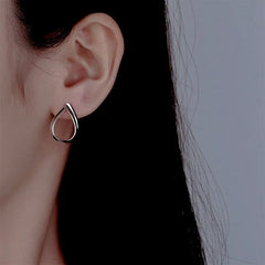 Close-up detail of the sparkling zircons and plating on the Water Drop Earrings
