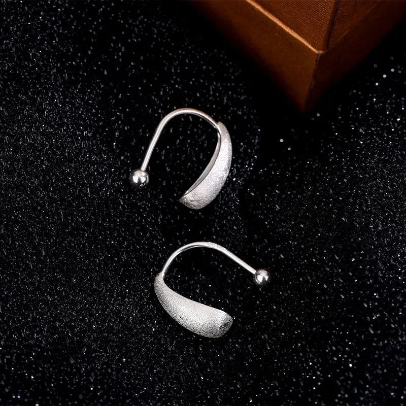 Close-up detail of the sparkling zircons and plating on the Water Drop Studs
