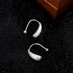 Close-up detail of the sparkling zircons and plating on the Water Drop Studs