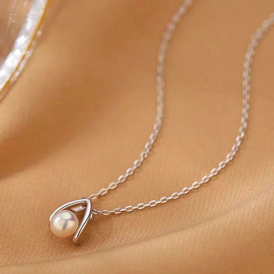 Sterling Silver Water Drop Split Pearl Necklaces worn to showcase its length and pendant detail