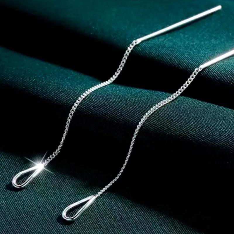 Angled view of the Sterling Silver Water Drop Threader Earrings