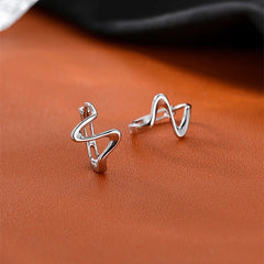Close-up detail of the sparkling zircons and plating on the Wave Hoop Earrings