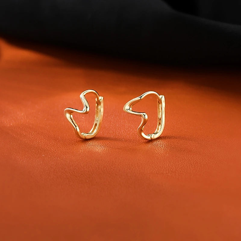 Angled view of the Sterling Silver Wave Pattern Earrings