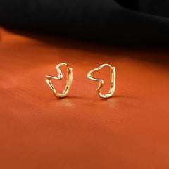 Angled view of the Sterling Silver Wave Pattern Earrings