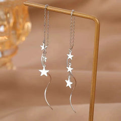 Close-up detail of the sparkling zircons and plating on the Star Threader Earrings