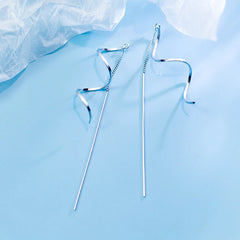 Close-up detail of the sparkling zircons and plating on the Wavy Tassel Earrings