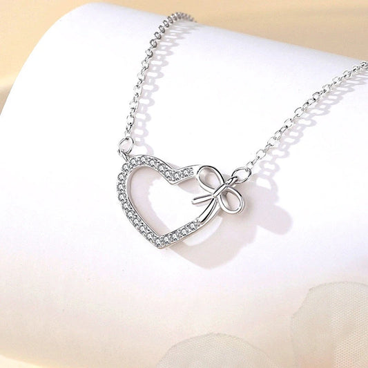 Sterling Silver Wish Heart Necklace worn to showcase its length and pendant detail
