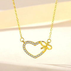 Close-up of the pendant and clasp on the Wish Heart Necklace