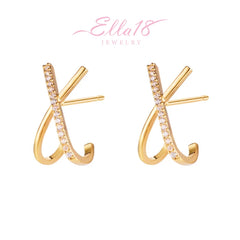 Angled view of the Sterling Silver X-Shaped Diamond Stud Earrings