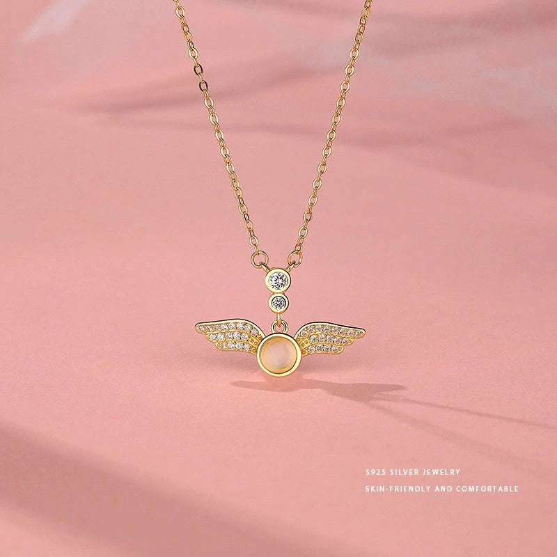 Detailed view of the Sterling Silver Zircon Angel Wing Necklace chain and pendant