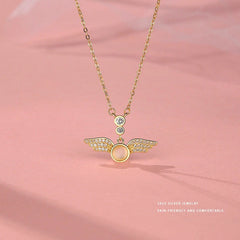 Detailed view of the Sterling Silver Zircon Angel Wing Necklace chain and pendant