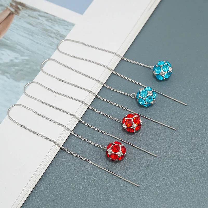 Angled view of the Sterling Silver Zircon Ball Threader Earrings