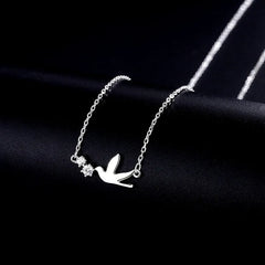 Sterling Silver Zircon Bird Necklaces worn to showcase its length and pendant detail