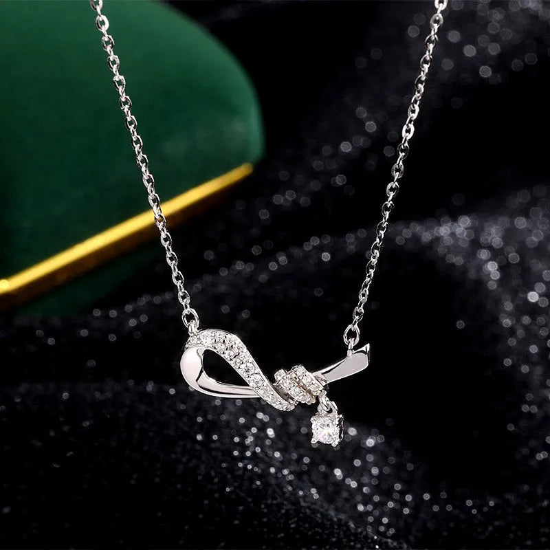 Sterling Silver Zircon Bow Necklace worn to showcase its length and pendant detail