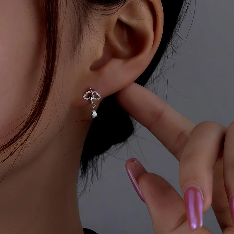 Angled view of the Sterling Silver Zircon Cloud Lightning Earrings