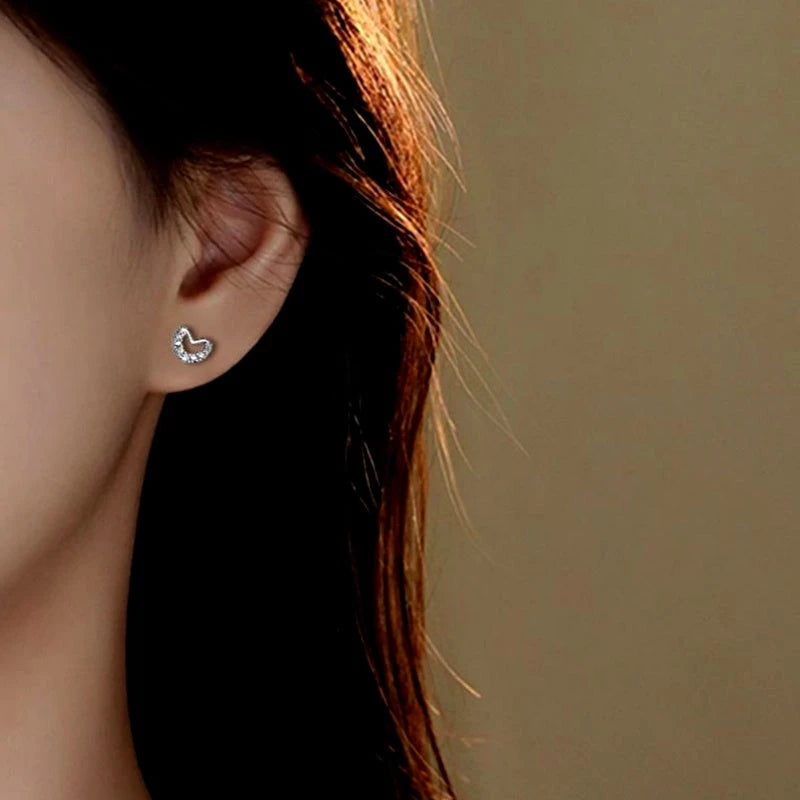 Close-up detail of the sparkling zircons and plating on the Zircon Heart Studs