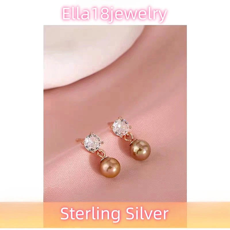 Close-up detail of the sparkling zircons and plating on the Pearl Drop Earrings