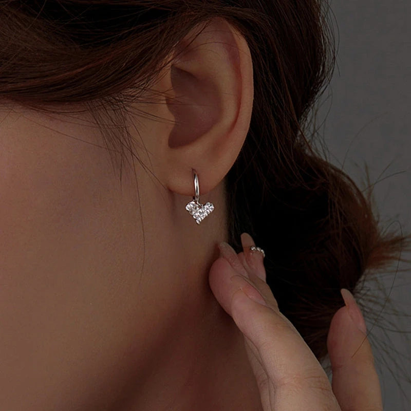 Close-up detail of the sparkling zircons and plating on the Zircon Heart Dangle Earrings