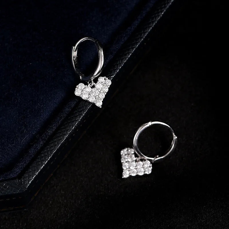Angled view of the Sterling Silver Zircon Heart Earrings