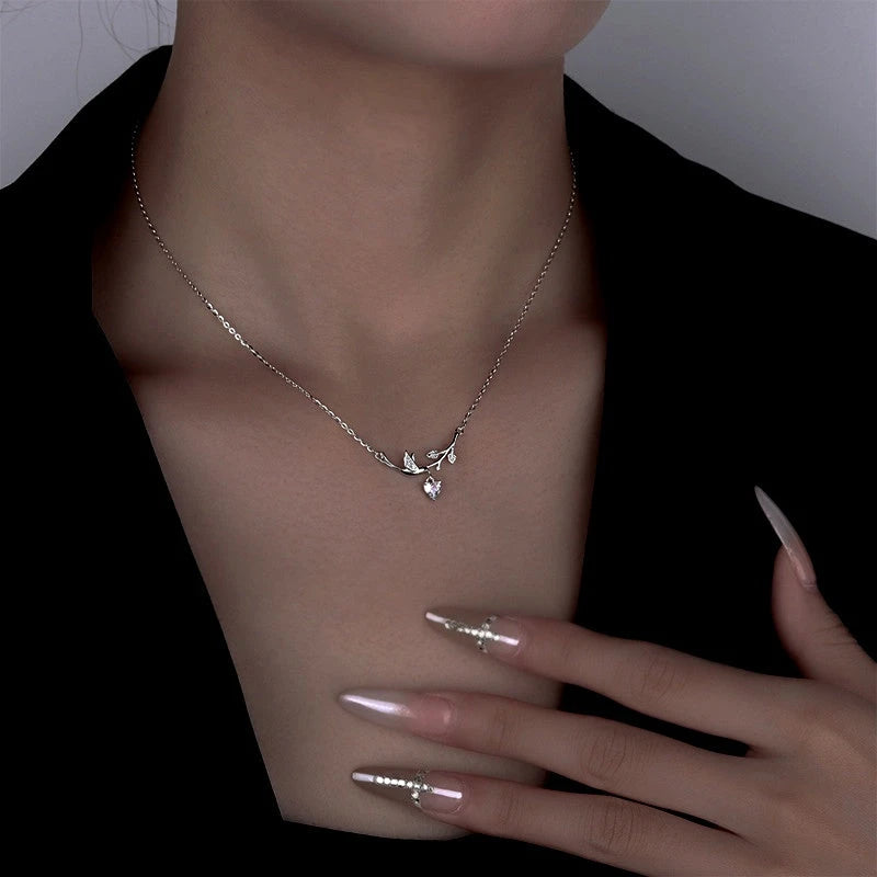 Sterling Silver Zircon Heart Leaf Earrings - beautiful Heart Leaf Necklace (*Correction: Handle says earrings, tags say necklace. Price point fits a necklace better.*)