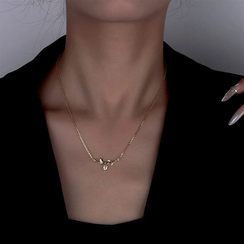 Close-up of the pendant and clasp on the Heart Leaf Necklace (*Correction: Handle says earrings, tags say necklace. Price point fits a necklace better.*)