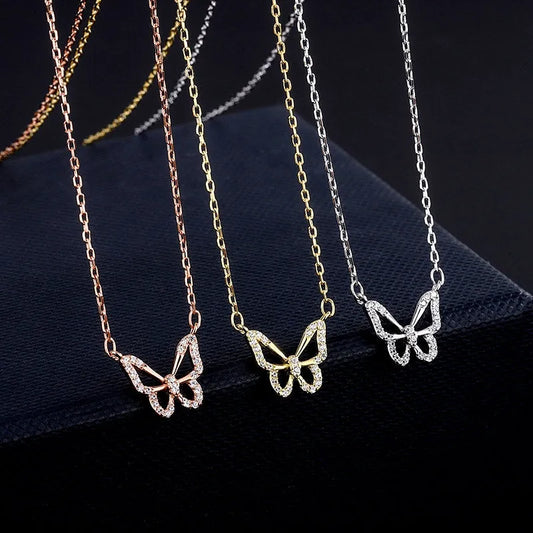 Sterling Silver Zircon Hollow Butterfly Necklace worn to showcase its length and pendant detail