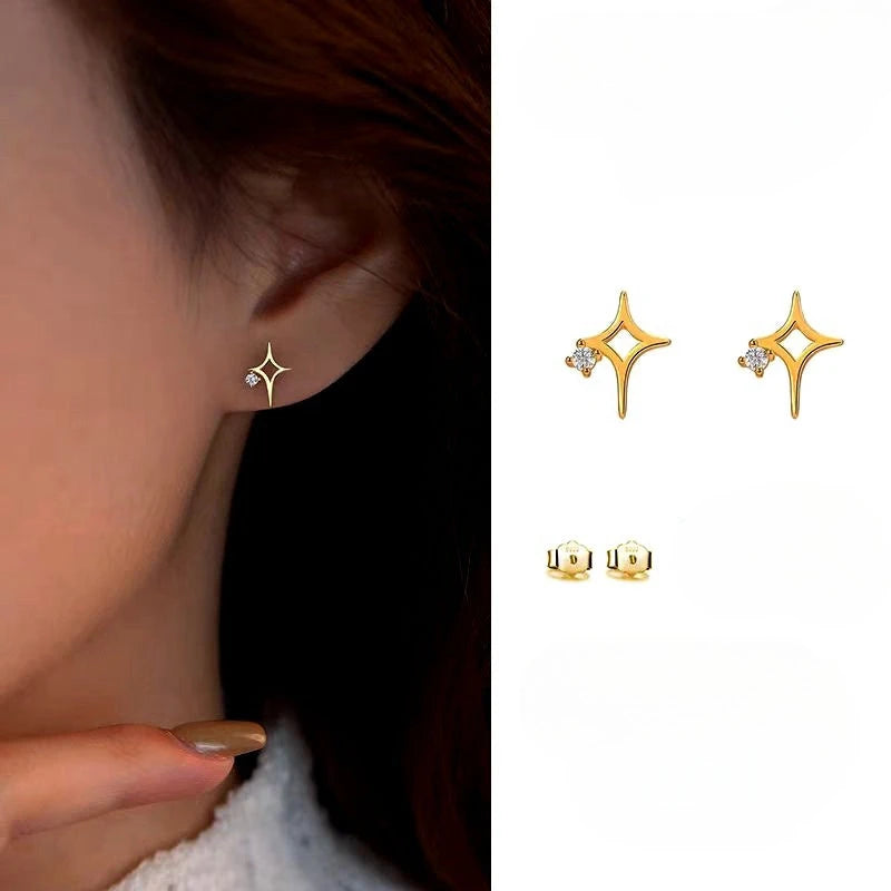 Angled view of the Sterling Silver Zircon Hollow Four-Cornered Star Stud Earrings