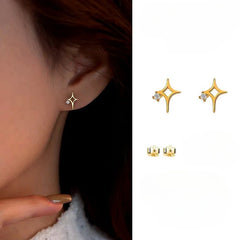 Angled view of the Sterling Silver Zircon Hollow Four-Cornered Star Stud Earrings