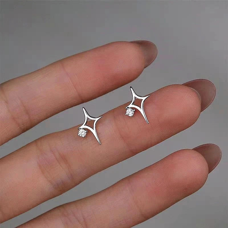 Close-up detail of the sparkling zircons and plating on the Star Stud Earrings