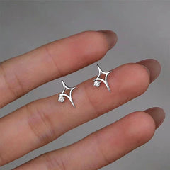 Close-up detail of the sparkling zircons and plating on the Star Stud Earrings